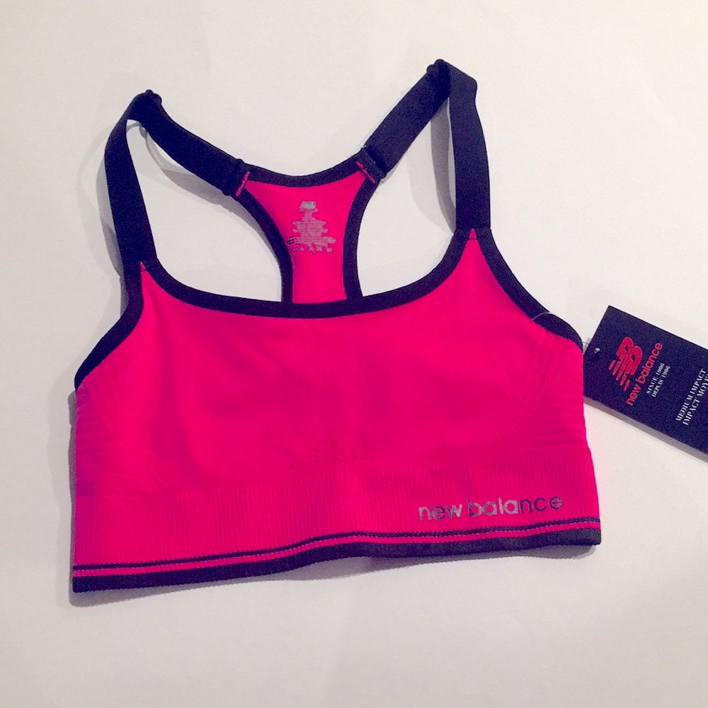 NWT! New Balance women’s alpha pink sports bra. Medium impact workouts. Size S.
